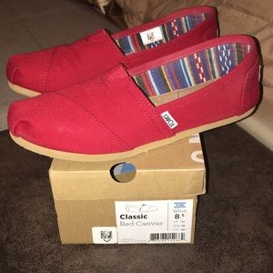 WORN ONCE TOMS original flats size 8.5 in red